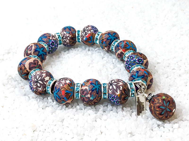 To emerge in illuminating light.